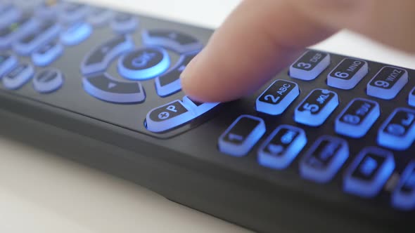 Slow motion pressing buttons on TV remote control slow motion video ...