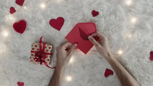 Opening I Love You Card With Valentine's Gift