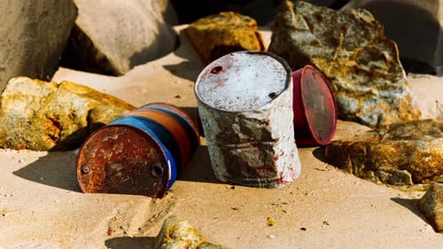 Old Oil Barrell on the Sand Beach
