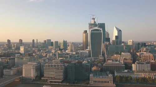 London Skyline at Sunset or Sunrise, Futuristic modern Skyscrapers in construction, Establishing Aer