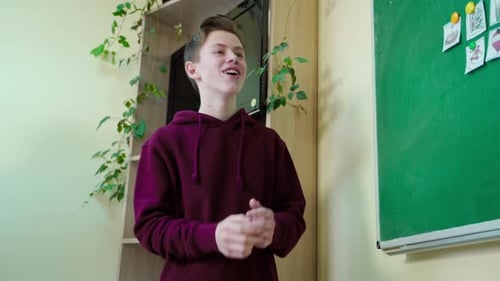 Teen Student Giving a Presentation in Classroom