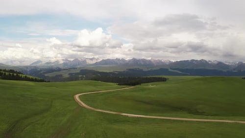Mountain peaks and grassland