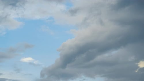 Dramatic Sky with Moving Grey Clouds