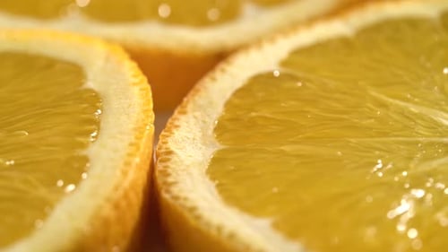 Orange Slices Closeup, Macro Food Summer Background, Fruits Top View. Rotate