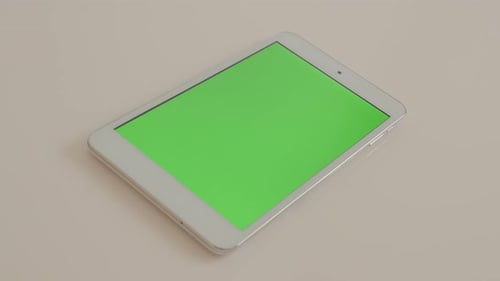 White Tablet with Green Screen for Compositing