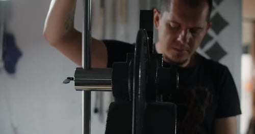 Craftsman Uses Hand Press at His Workshop