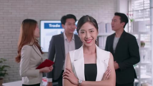 Confident Businesswoman Smiling in Modern Office Environment