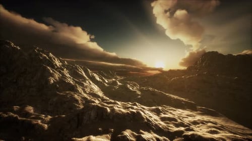 Sun Rays Over Mountains in a Valley