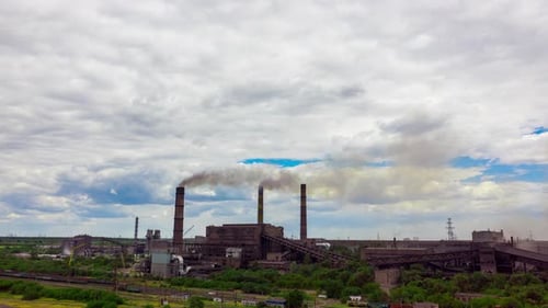 Industrial Complex Emitting Smoke Aerial View