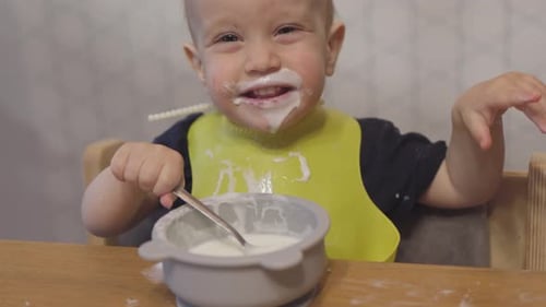 Funny Baby Toddler Learning to Eat with Spoon Child Learn Eating Use Teaspoon