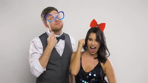 Couple with Party Props Having Fun and Posing 70