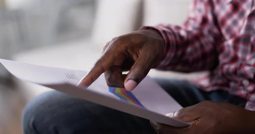 Adult Male Studies Business Reports At Home