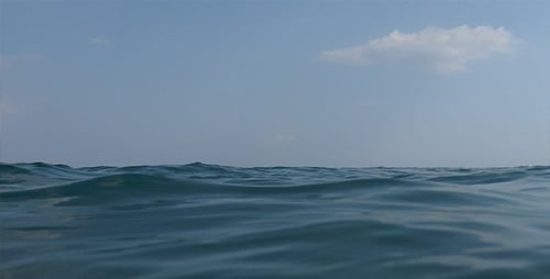 Mesmerizing Ocean Waves and Sunlight Underwater