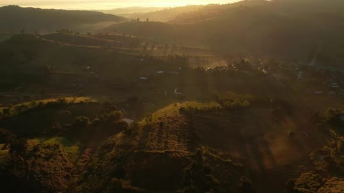 4K Morning mist over a rural village in the high mountains.