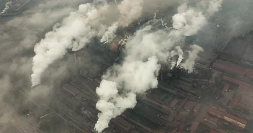 Top View of the Metallurgical Plant. Smoke Coming Out of Factory Pipes. Ecology