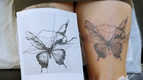 Butterfly Tattoo Being Applied on Thigh
