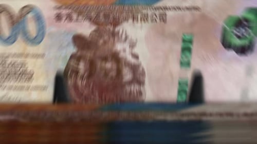 Chinese yuan vs Hong Kong Dollar money banknote loop