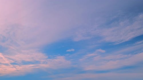 Time Lapse of Pink Clouds in Blue Sky