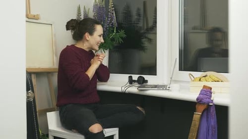 Woman Working on Computer, Celebrating Good News