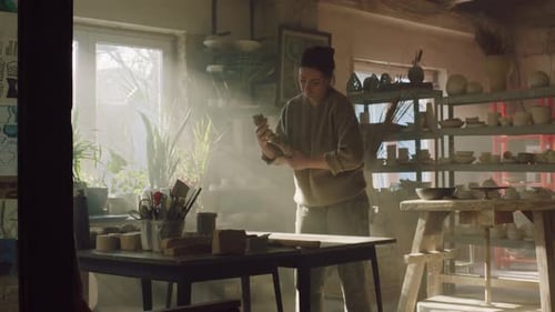 Craftswoman Is Working With Raw Clay