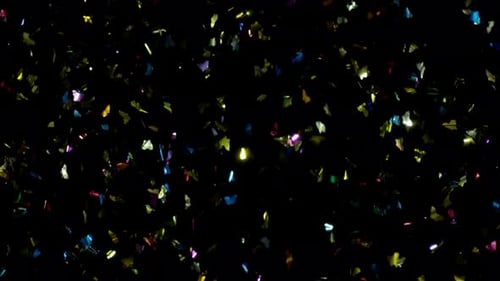 Falling Multicolored Confetti on Black Background