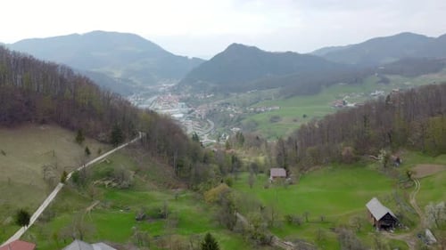 Reveal of stunning small town placed between hills.