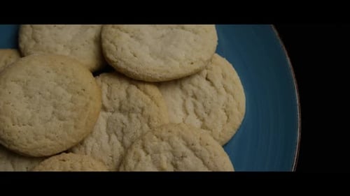 Tasty Sugar Cookies Piled on a Blue Plate