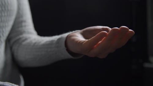 Close Up of Woman Spraying Hand Sanitizer