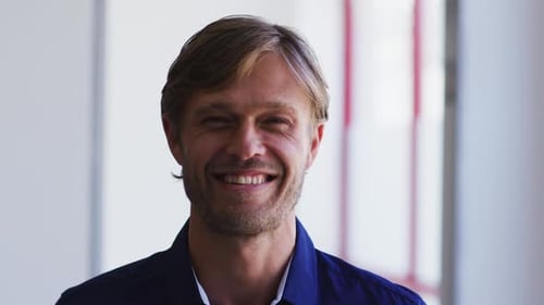 Portrait of caucasian man smiling at home