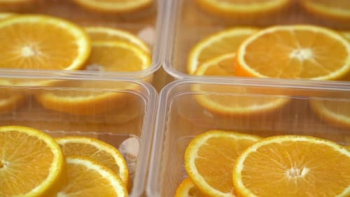 Rotate Fresh Citrus Oranges Fruits. Seamless Loop Spinning Sliced Oranges.