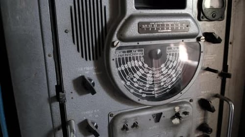 Vintage Machine with Dials, Gauges, and Switches
