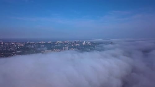 Aerial View of Very Dense Morning Fog in City