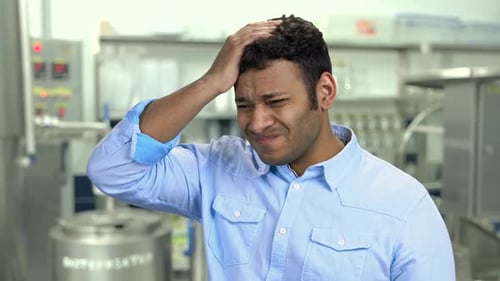 Close Up Exhausted Man Suffering From Headache