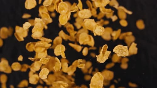 Crispy Cornflakes Floating in Slow Motion