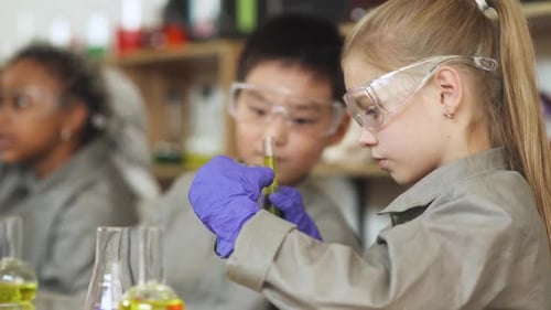 Children Doing Science Experiment in Lab with Glassware