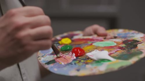 Mixing Oil Paints on Palette with Brush