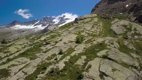 Majestic Mountain Peaks and Rocky Slopes Aerial