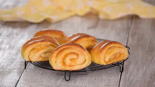 Freshly Baked Homemade Yeast Buns with Apricot Jam