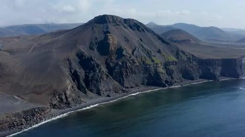 Drone View of Spectacular Black Volcanic Cliff in Iceland