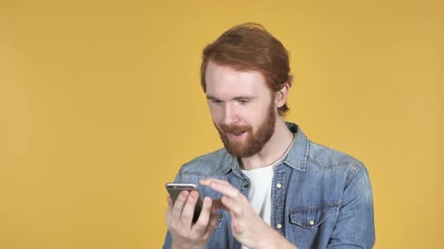 Young Adult Using Mobile Phone With Varying Emotions