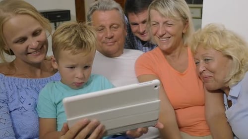 Family Watching a Tablet Together