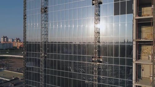 Construction Aerial View of Building Glass Skyscraper Business Center View From Height Reflections
