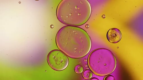 Colorful Liquid with Abstract Oil Bubbles Macro Shot