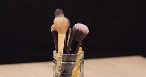 Makeup Brush Set on Table Rotating