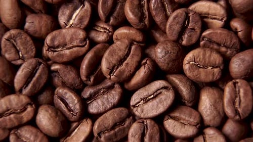 Roasted Coffee Beans Filling the Frame, Slow Zoom