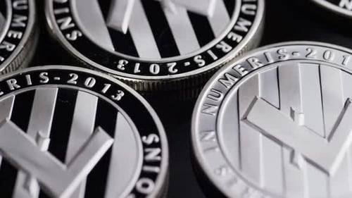 Rotating shot of Bitcoins (digital cryptocurrency) - BITCOIN LITECOIN 400