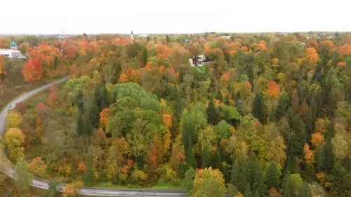 Aerial View of the Sigulda Bridge and Cable Car Over Gauja River During Golden Autumn Season Latvia