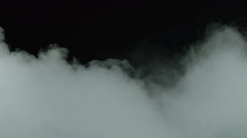 Abstract White Vapor Swirls on Black Background