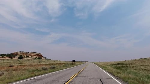 POV driving down scenic road in South West USA