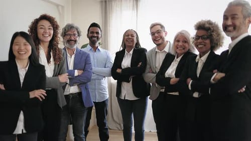 Diverse Business Team Smiling with Arms Crossed
